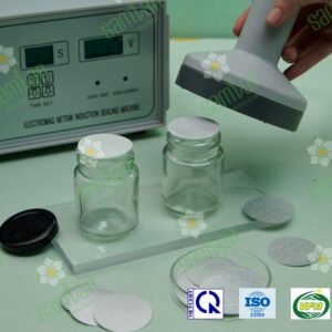 Induction cap sealing for glass bottle